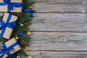 Christmas composition on wooden background with gift boxes and copy space