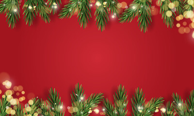 New Year and Christmas background with pine branches and light glare on red backdrop. Holiday banner with space for text.