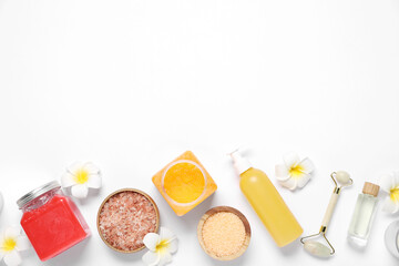 Flat lay composition with spa essentials on white background. Space for text
