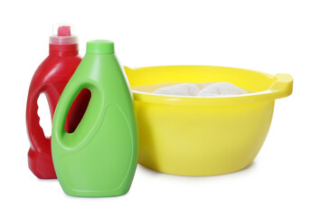Plastic basin with towel, water and detergents isolated on white