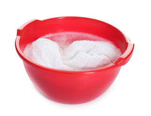 Plastic basin with towel and water isolated on white