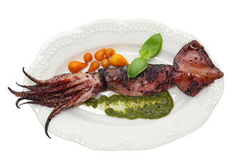 Tasty cooked squid with sauce, tomatoes and basil isolated on white, top view