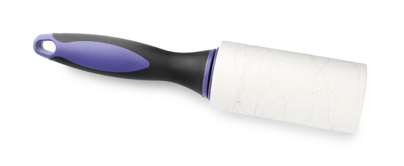 One lint roller with used sticky tape isolated on white, top view