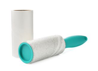 Lint roller with used sticky tape and new adhesive roll isolated on white