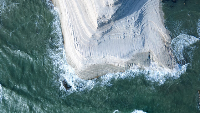 Aerial view of Scala dei Turchi, white limestone cliffs in Realmonte, Sicily, Italy, natural wonder and coastal attraction