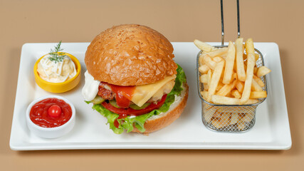 Burger and fries on tray
