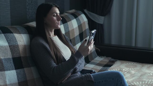 A young woman receives bad news during a phone call, ends the conversation, and sighs sadly. Her face shows emotional pain, sadness, and disappointment. The atmosphere is heavy and reflective