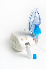 Medical inhaler, nebulizer, nebular. Respiratory medicine. Asthma breathing treatment. Bronchitis, asthmatic health equipment. Electric nebulizer for cough treatment on white background.
