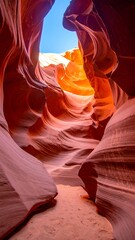 Scenic, natural sandstone formations within a narrow, sunlit canyon