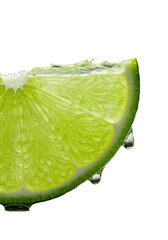 Extreme macro of vibrant emerald green lime wedge with glistening juice droplet poised to drip, isolated on transparent background, low-angle, dramatic raking light. Concept of natural freshness