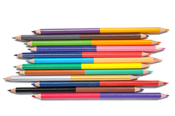 Double-ended colorful pencils on white background