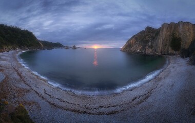 Sunset Over Silence Beach in Asturias, Spain