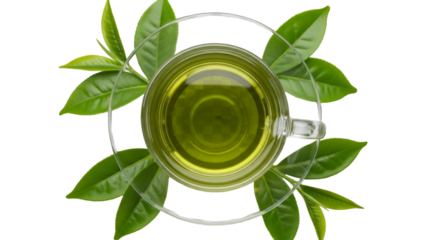 Overhead view of a glass cup of green tea with fresh leaves