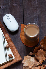Business concept. A cozy autumn still life with office supplies.