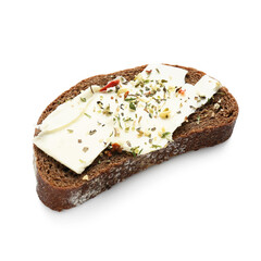 Slice of fresh bread with butter and herbs on white background