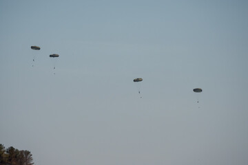 military CDS parachte containers dropped by an RAF Airbus C.1 A400M Atlas military transport aircraft