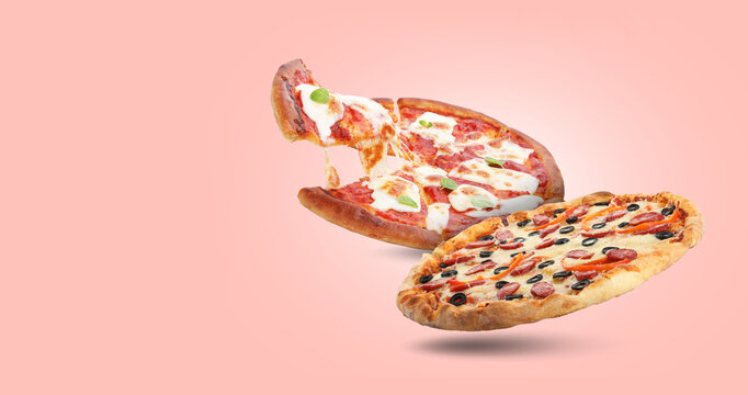 Different delicious pizzas in air on pink background. Banner design with space for text