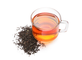 Cup of black tea and dry leaves isolated on white background, closeup