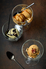 various ice cream in glass bowls