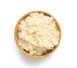 Wooden bowl of horseradish sauce on white background