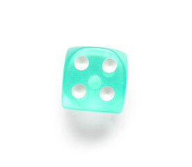 Turquoise game dice on white background