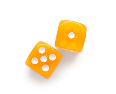 Orange game dices on white background