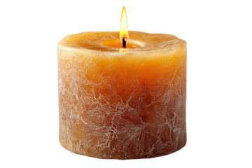 A large amber colored pillar candle with a beautiful crystallized texture is lit and burning creating a warm glow against a stark  isolated on transparent background, perfect cutout, PNG