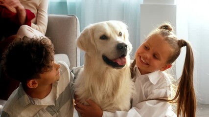 At a cozy home, two children share joyful moments with a golden retriever on Thanksgiving Day. Family gathering features laughter, love, and gratitude under bright sunlight. - Powered by Adobe