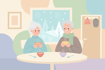 Cozy senior couple sips warm drinks by window on snowy day enjoying home comfort