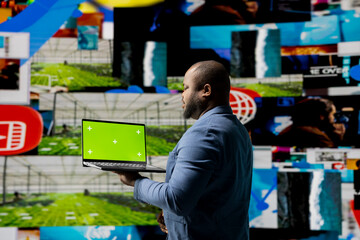 Social media environment with a person using copy space device, surrounded by tech visuals, infographics and digital apps. Emphasizing communication and web entertainment. Digitalization.