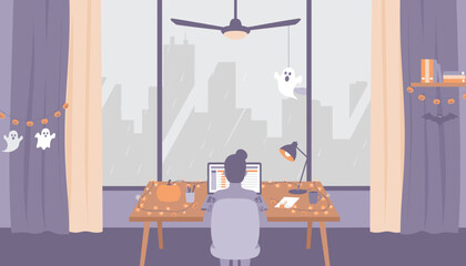 Cozy Halloween work from home decorated desk laptop rainy city view remote productivity