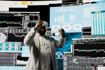 African american entrepreneur using VR headset to review infographics, studying big data monthly reports for business development and productivity. Professional high tech administrator.