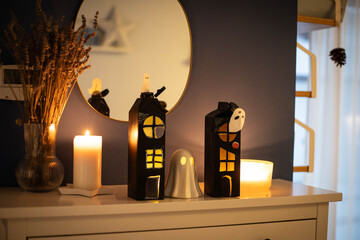 black halloween haunted houses  made with  upcycled packaging. DIY spooky cheap craft idea. Side view.