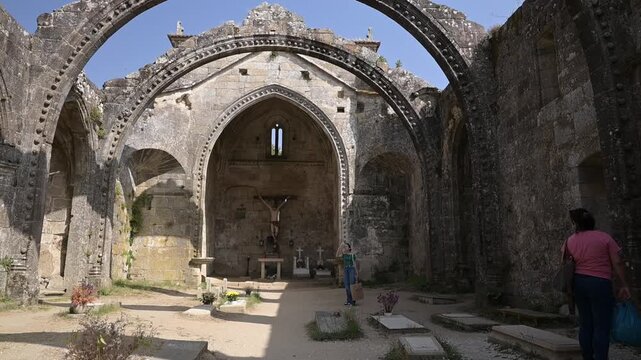 Tourists visiting the ruins of Santa marina dozo church on a summer day