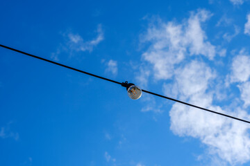 outdoor light fixture with serene sky backdrop