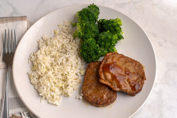 salisbury steak  with rice and broccoli