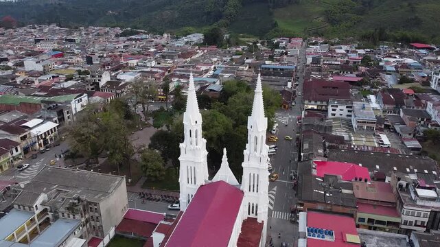 Aerial view of the city, the park and its church, Libano Tolima