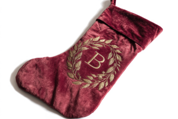 Elegant velvet Christmas stocking with embroidered initial B holiday decoration for gifts and festive season isolated on white