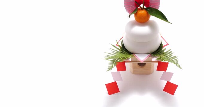 白背景で鏡餅をターゲットにティルトダウン撮影した4K動画
