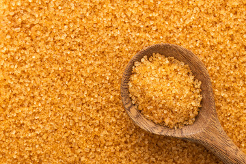 Saccharum officinarum - Organic brown cane sugar in spoon