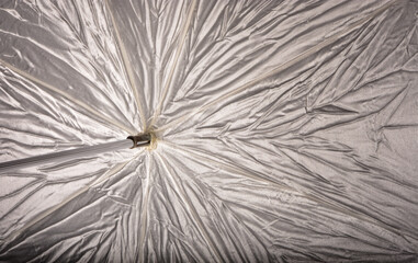 Reflective material of light modifier in photography studio.