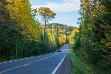 Hills and trees along the Gunflint Trail in northern Minnesota on a sunny fall afternoon