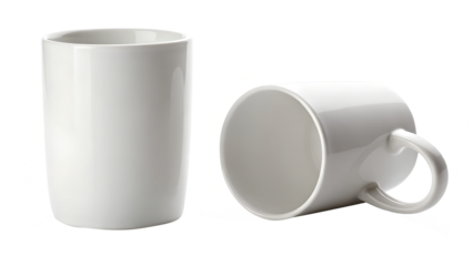 Two white ceramic mugs one upright and one lying on its side isolated on transparent background