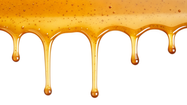 Golden honey dripping in thick strands from a viscous liquid isolated on transparent background