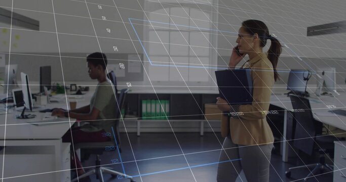 Speaking on smartphone Korean woman holding dark blue folder in modern open plan office, copy space