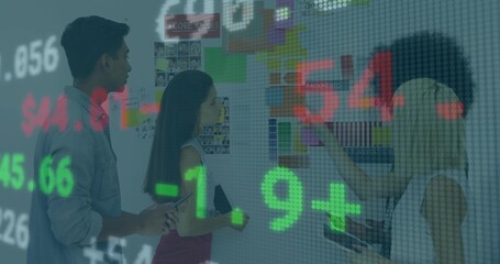 Team collaborating around board in office, with color swatches numeric overlay smartphone tablet