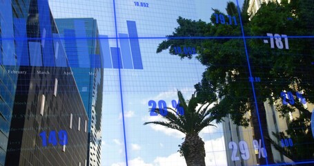 Naklejka premium Featuring palm tree standing beside broadleaf tree in financial district, skyscrapers, data overlay