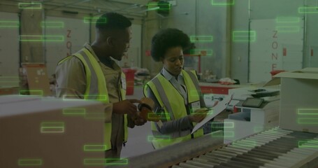 Reviewing documents with clipboard and scanner at warehouse station with boxes on conveyor belt