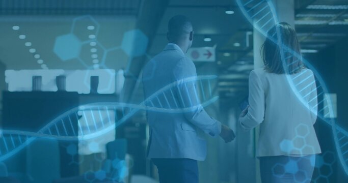 Walking business colleagues discussing research in corporate corridor, with DNA helix overlays