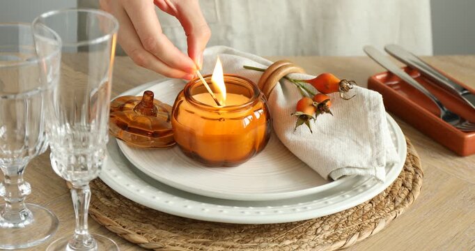 Beautiful table setting with autumn decor on wooden background, closeup